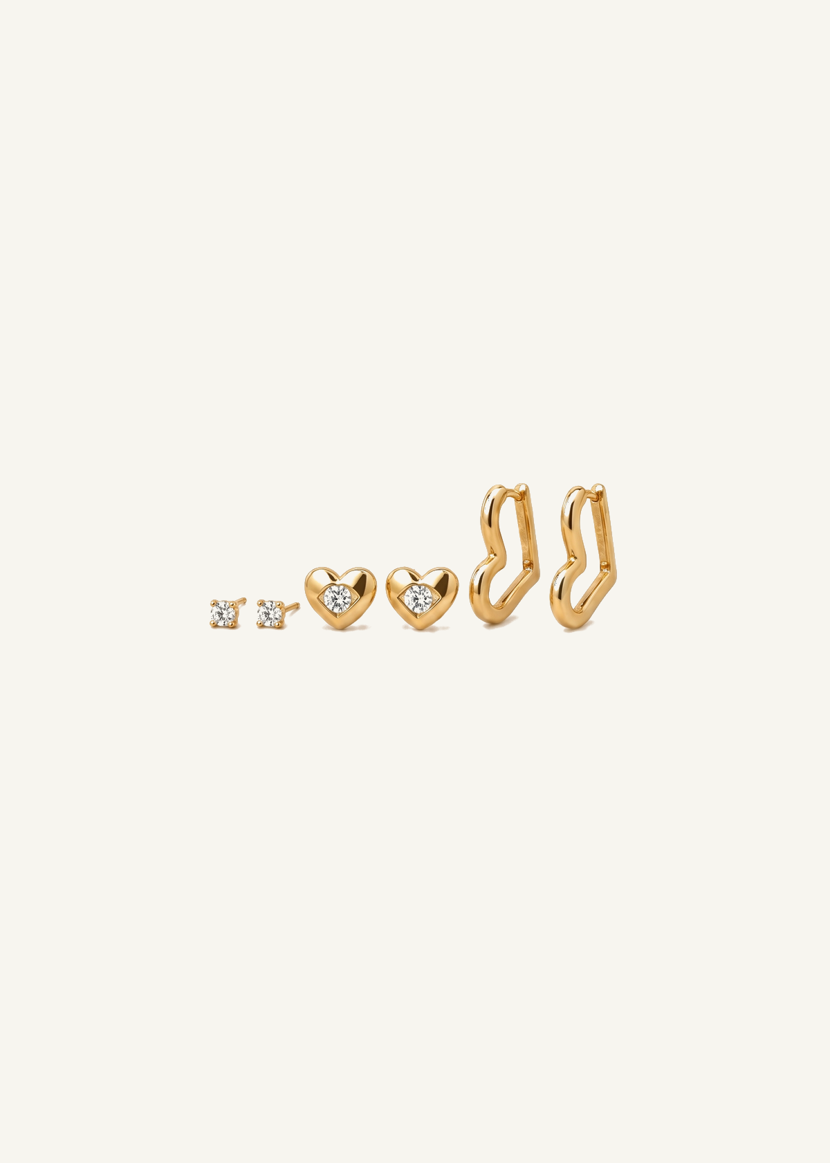Gold Heart Earring Set with Huggie Hoop & CZ Heart Studs — off-white background hero