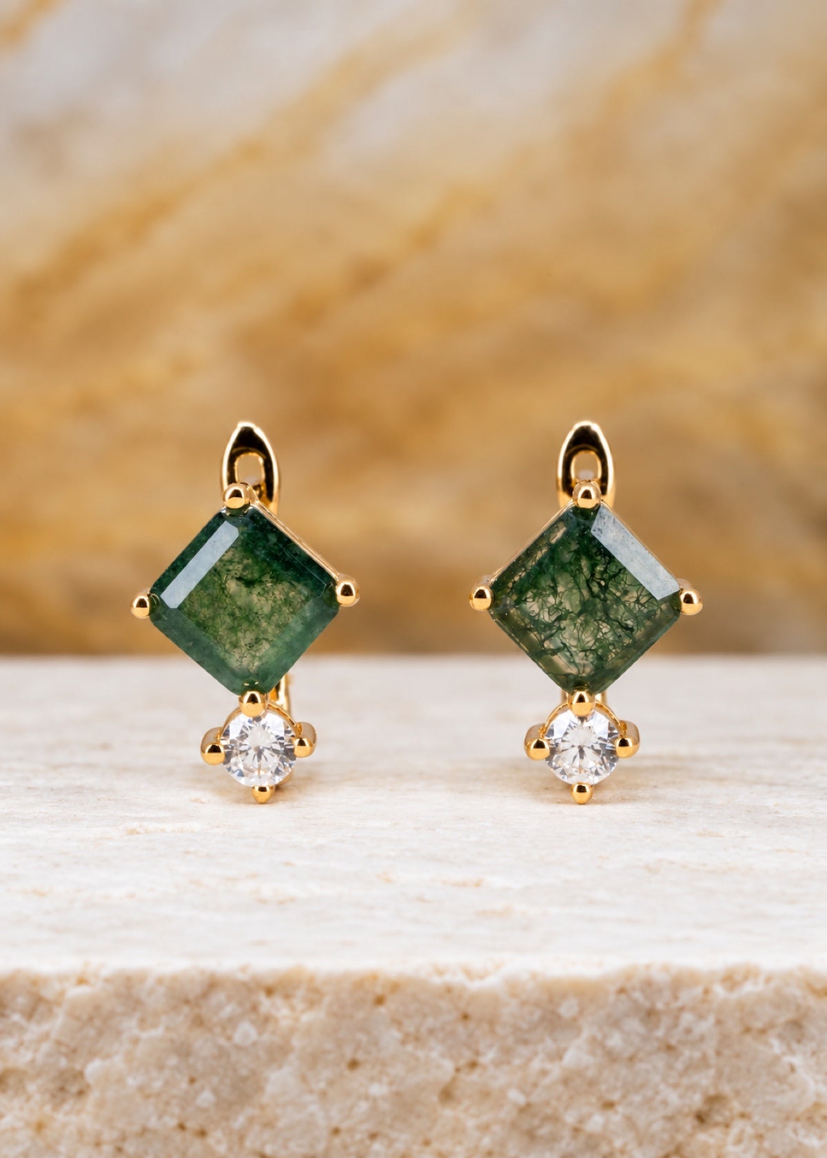 Front view of square moss agate huggies showing green stones and CZ drops