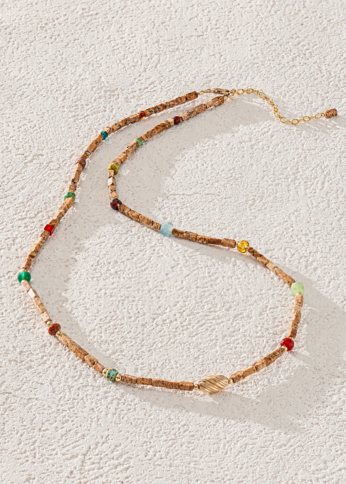 Landscape jasper choker laid out to show its chain and clasp