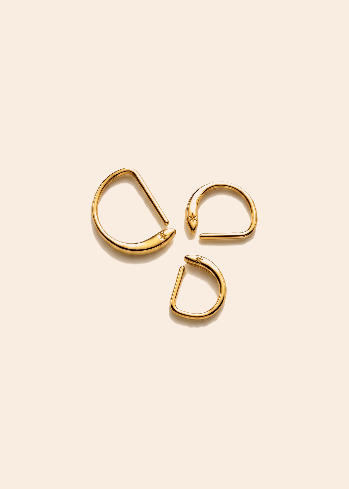 D Shape Sleeper Earrings — off-white background hero
