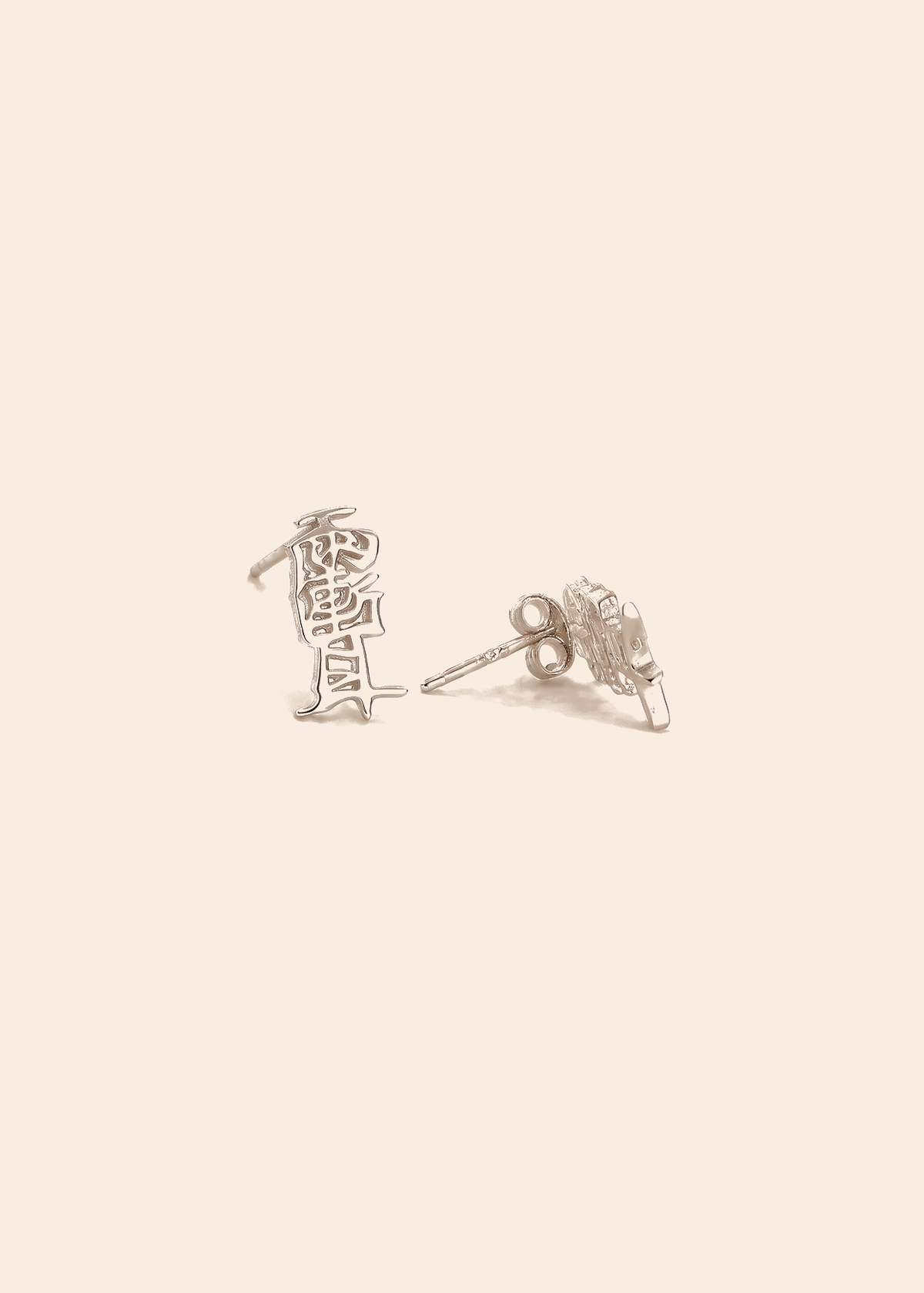 Taoist Amulet Stud Earrings — off-white background hero
