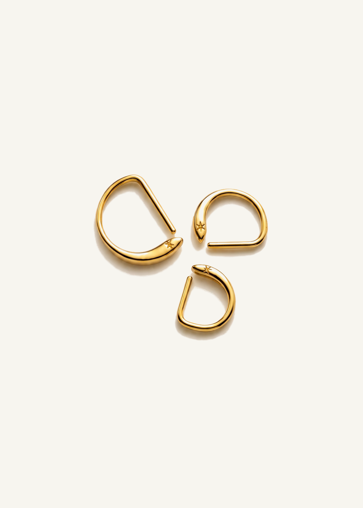 D Shape Sleeper Earrings — off-white background hero