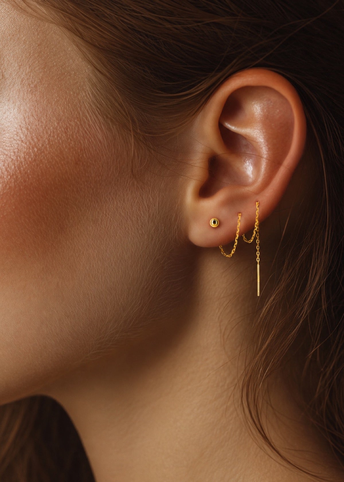 Ball threader earrings worn as fine dangling chains with ball accents